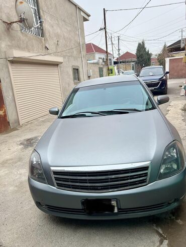 qadin masini: Nissan Teana: 2.4 l | 2005 il Sedan