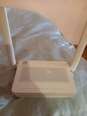 simsiz internet baki: Huawei dual antennalı Wi‑Fi router/ONT - Brend: Huawei - Üst hissədə — 1