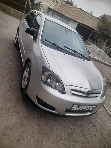 фольксваген тигуан л с: Toyota Corolla: 1.4 л | 2005 г. Хэтчбэк — 5