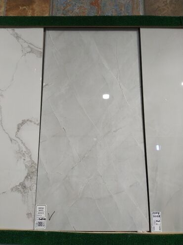 metbex kafeli: Məhsul: “VINTAG WHITE” keramika plitə Ölçü: 60 x 120 sm Səth: Parlaq