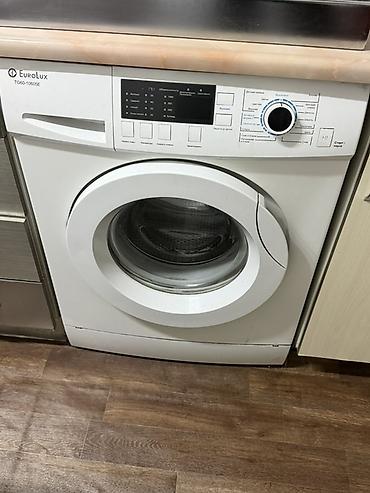 сдаем швейный цех: Стиральная машина EuroLux T060-10065E, фронтальная загрузка. Рабочая — 1