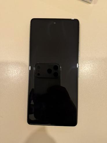 gogle pixel 9: Google Pixel 7, 128 GB, rəng - Qara, Simsiz şarj — 2