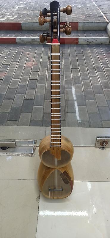 Tar: Tar Rast musiqi alətləri mağazası. Əhmədli, İnşaatçılar və Sumqayıtda — 1