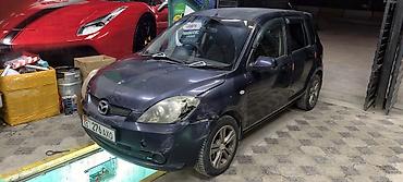 обмен на квартира: Mazda Demio: 2003 г., Автомат, Бензин — 5