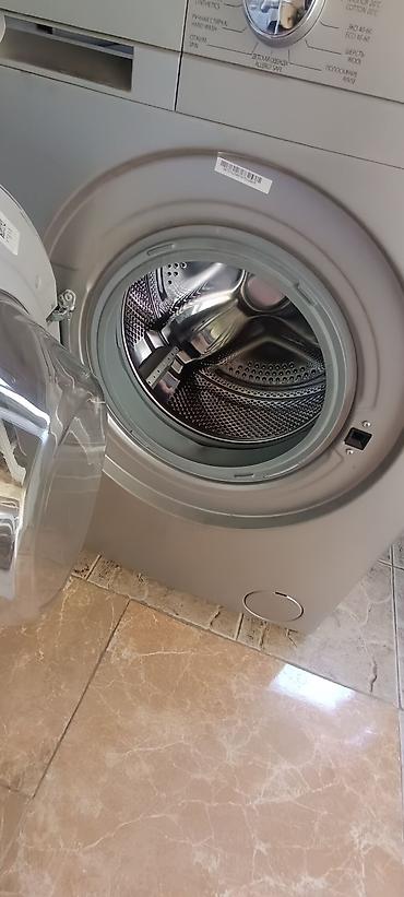 apple 5 s: Ön yükləməli paltaryuyan maşın – gümüşü rəng Xüsusiyyətlər: - Ön — 3