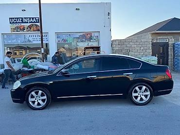 termostat satisi: Nissan Teana JK230 – biznes sinfi sedan Xüsusiyyətlər: - Korpus: qara — 4