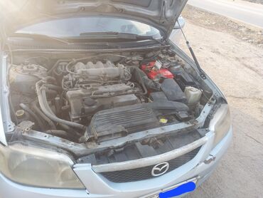 Mazda: Mazda 323: 2003 г., 1.6 л, Автомат, Бензин, Хэтчбэк