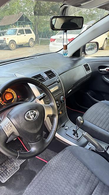 suret panel: Toyota Corolla: 1.6 l | 2007 il Sedan — 7