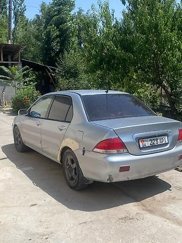 митсубиши спейс стар: Mitsubishi Lancer: 2005 г., 1.6 л, Механика, Бензин, Седан — 6
