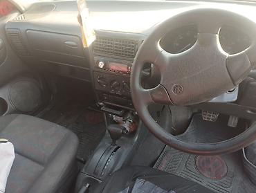 автомобиль для детей: Volkswagen Polo: 1997 г., Механика, Бензин, Хэтчбэк — 6