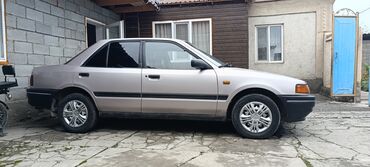 Mazda: Mazda 323: 1993 г., 1.6 л, Механика, Бензин, Седан