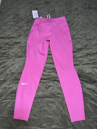 Helanke, biciklistički šortsevi: NIKE Swift Women's High-Waisted 7/8 Running Leggings with Pockets vel — 6