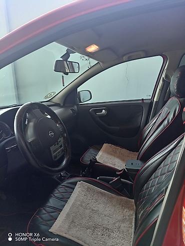 opel kupe: Opel Corsa C, hetçbek, qırmızı rəng. -rahat, təzə qoltuqlar Şəhər — 3