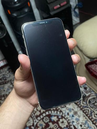 Apple iPhone: IPhone X, Б/у, 64 ГБ, Серебристый, Чехол, 73 % — 2