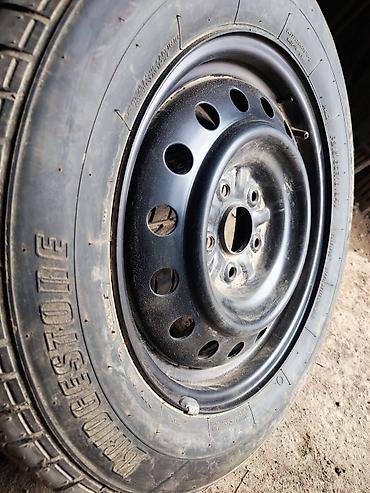 шины 225 60 16: Летняя шина Bridgestone Potenza RE92 на стальном диске — 1