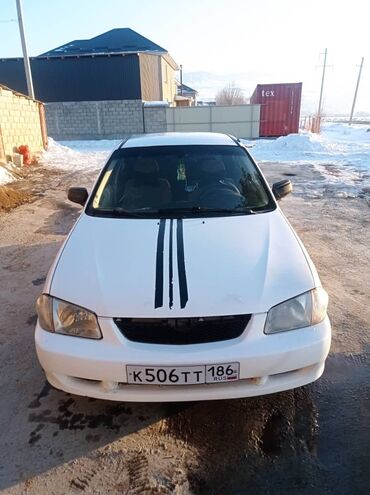 одноместная машина: Mazda Protege: 1999 г., 1.6 л, Автомат, Бензин, Седан