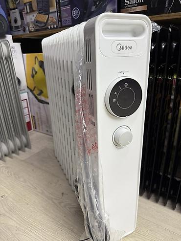 midea: Масляный обогреватель Кол-во секций: 10 и более, Несколько режимов мощности — 2