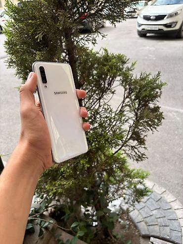 телефон fly f: Samsung Galaxy A50, 64 ГБ, цвет - Белый, Две SIM карты — 7