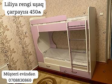 liliya: Liliya rəngində iki mərtəbəli uşaq çarpayısı. Üst mərtəbəyə — 1