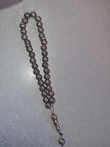 tesbeh: Metal təsbeh – kərbəladan gəlmədi. ipnən deyil dəmirdən yiğilib. yəni — 2