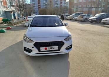 продаю мерседес сапог всё модели бишкек: Белый седан Hyundai Solaris, оснащенный черной радиаторной решеткой и