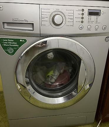 Elektronika: LG paltaryuyan maşın, ön yükləməli model. Üzərində “DirectDrive 5 kg” — 1