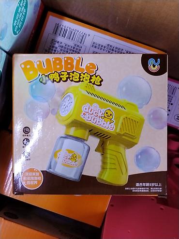 quick push pop it: Игрушка «Duck Bubble» — автоматический пистолет для мыльных пузырей — 1