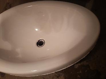 • Oval formalı şaquli üstəqoyma (countertop) lavabo • Material: ağ