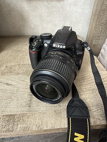 dji phantom: Зеркальный фотоаппарат Nikon D3100 с комплектным объективом AF‑S DX — 1