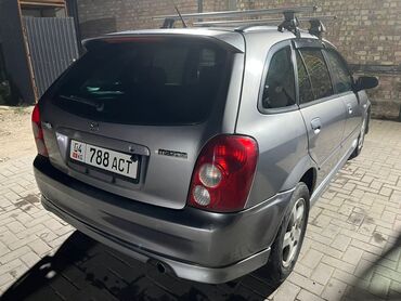 Mazda: Mazda Familia: 2003 г., 1.5 л, Автомат, Бензин, Хэтчбэк — 4