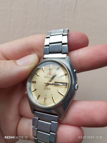 tek qaş üzüklər: İşlənmiş, Qol saatı, Orient, rəng - Qızılı