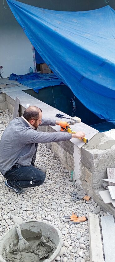 Plitə işləri: Xidmət: Hamam/tualet üçün istilikli döşəmə və kafel-metlax işləri — 26