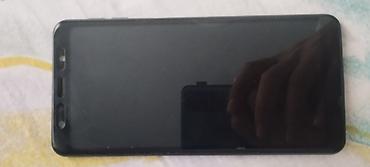 playstation 4 nece manatdir: Samsung Galaxy A7 2018, 64 GB, rəng - Qara, Barmaq izi — 2