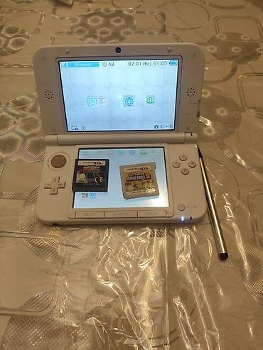 oyun adlari: Nintendo 3DS XL (ağ rəng) portativ oyun konsolu

barter var ve torg — 2