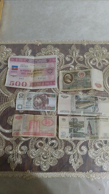Hamisi bir yerde 100 manat