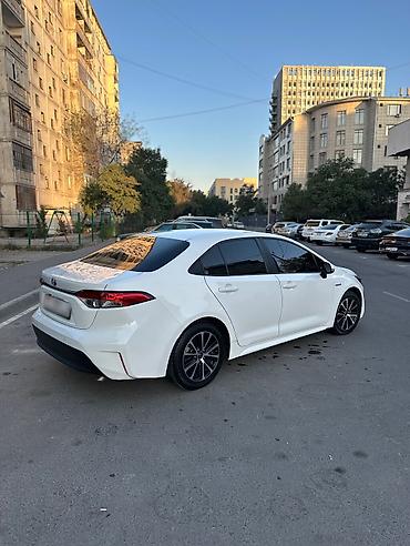 voxy noah: Toyota Corolla: 2023 г., 1.8 л, Вариатор, Гибрид, Седан — 4