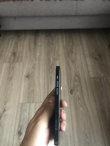 apple iphone 2g: IPhone 12, 128 GB, Qara, Face ID — 4
