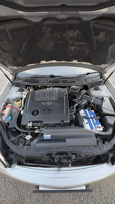 салон машины: Nissan Teana: 2003 г., 2.3 л, Автомат, Бензин, Седан — 9
