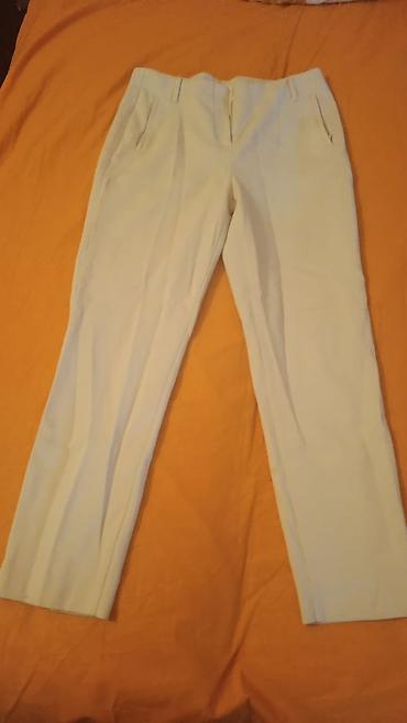 srebrne pantalone: 42 broj
14 — 1