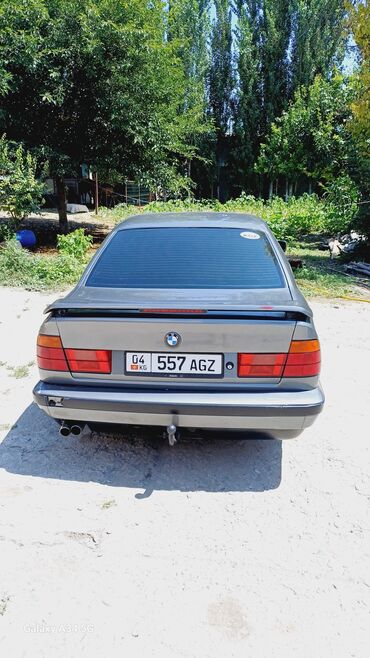 порог е34: BMW 5 Series (E34) седан, тёмно‑серый цвет. Основные особенности по