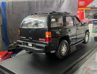 Avtomobil modelləri: Коллекционная модель GMC Yukon Denali black 2001 Welly Art  — 13