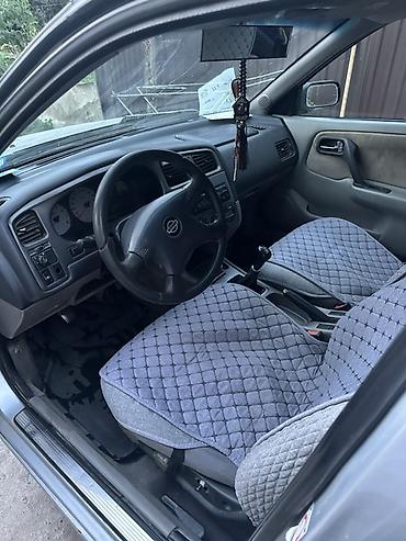 07 oturacaqlar: Nissan Primera Wagon – gümüş rəng, universal kuzov Xüsusiyyətlər: - — 7
