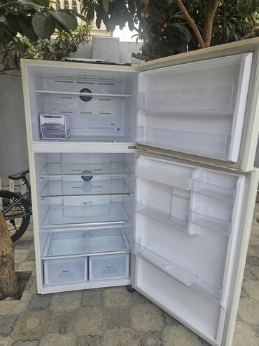 Маслобойки: İki qapılı soyuducu tam islekdir hal hazirdada isdiyir gelip baxa