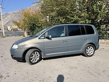 обмен на bmw: Volkswagen Touran: 2005 г., 1.6 л, Механика, Бензин, Минивэн — 2