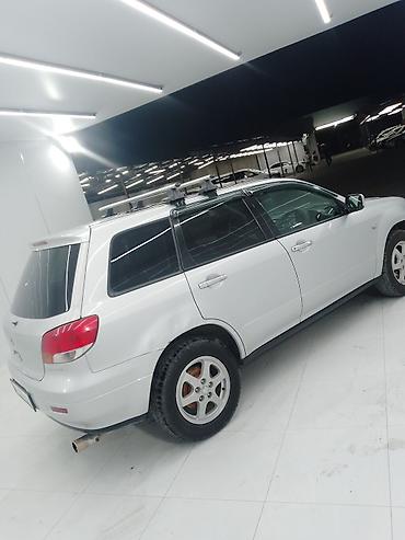 митсубиси аиртек: Mitsubishi Airtrek: 2001 г., 2.4 л, Автомат, Бензин, Внедорожник — 5