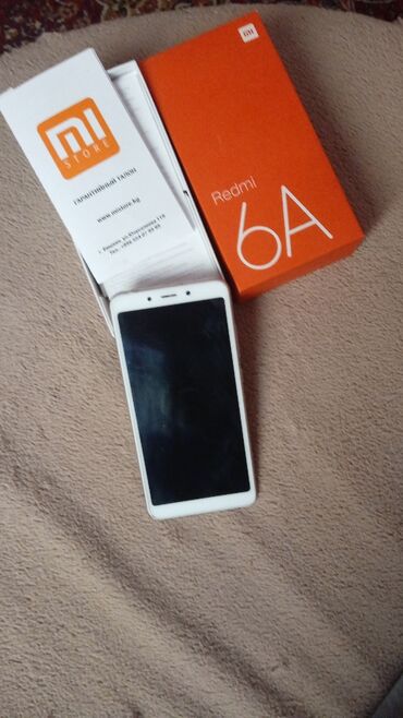телефоны редми 12: Смартфон Xiaomi Redmi 6A в белом цвете. Устройство оснащено черным