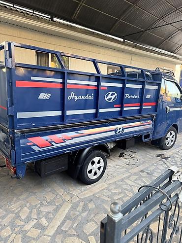 ресор на портер: Hyundai Porter II — компактный грузовик (бортовой) синего цвета — 3