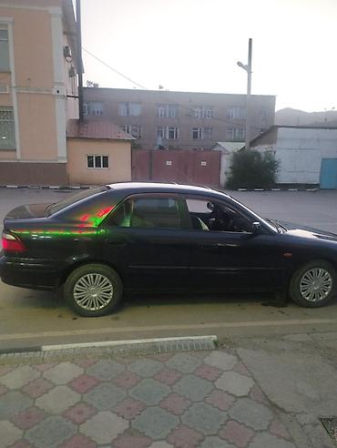 чехол на мопед: Mazda 626: 1998 г., 2 л, Механика, Бензин, Седан — 3