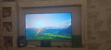 Телевизоры: Smart TV – TAUBE interfeysi ilə - Ekran: Təxminən 55–60 düym — 1