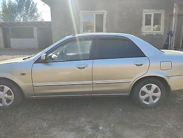 мата секыл: Mazda 323: 2000 г., 1.6 л, Автомат, Бензин, Седан — 3